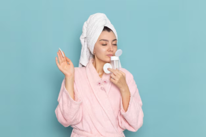 Woman using face wash to cleanse her skin