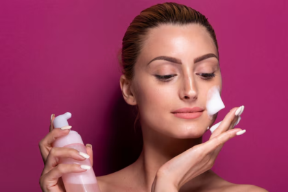 Woman using foaming face wash for cleansing